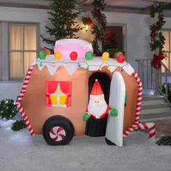 National Tree Company 7.5 ft. Inflatable Gingerbread Trailer with Santa with LED Lights