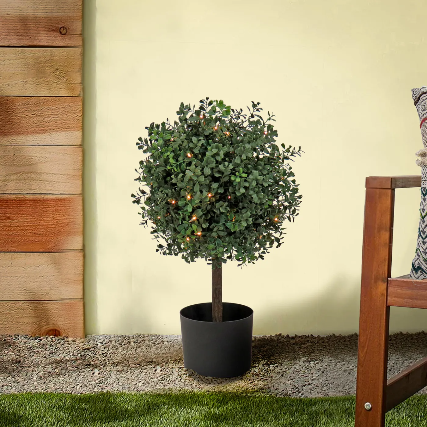 National Tree Company 2 ft. Pre-Lit Boxwood Single Ball Topiary in Black Nursery Pot with Clear Lights