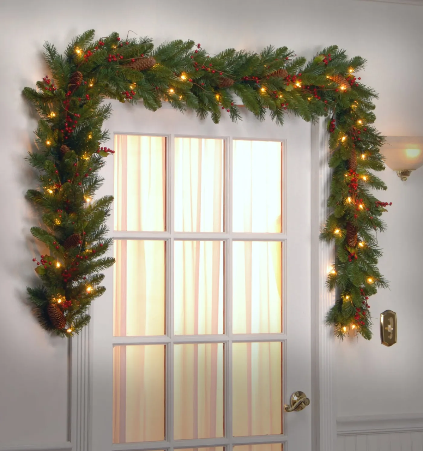 National Tree Company 9 ft. Pre-Lit Classical Collection Garland with Clear Lights and Holly Leaves