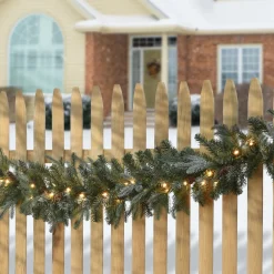 National Tree Company 9 ft. Pre-Lit Frosted Arctic Spruce Garland with Clear Lights