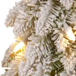National Tree Company 4 ft. Pre-Lit Snowy Downswept Forest Tree with Clear Lights