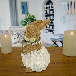 National Tree Company 10 in. Easter Bunny Table Decoration Decorated with White Flower Blooms Basket