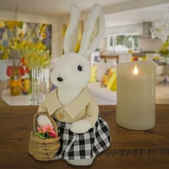 National Tree Company 12 in. Fluffy Female Bunny Holding Flower Basket Table Decoration
