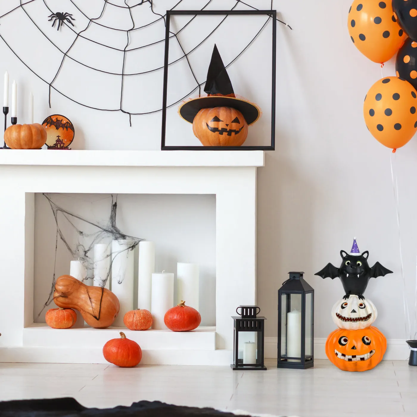 National Tree Company 22 in. Halloween Pre-Lit Bat Standing on Pumpkins Tabletop Decoration with LED Lights