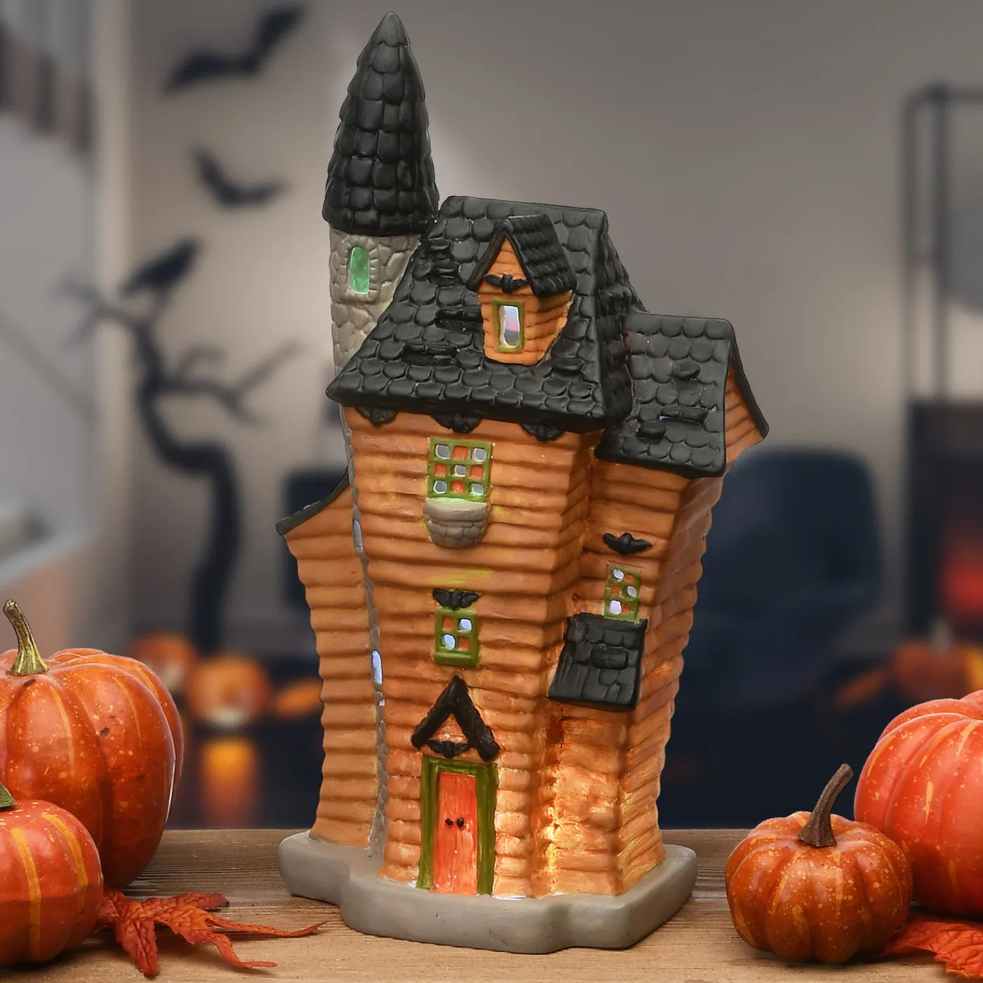 National Tree Company 12 in. Halloween Pre-Lit Black Haunted House Decoration with LED Lights