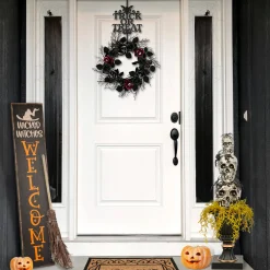 National Tree Company 32 in. Halloween Skull Tower with Spiders Tabletop Decoration in a Black Urn