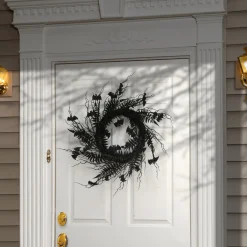 National Tree Company 24 in. Halloween Spooky Wreath with Bats, Fern Leaves, Branches