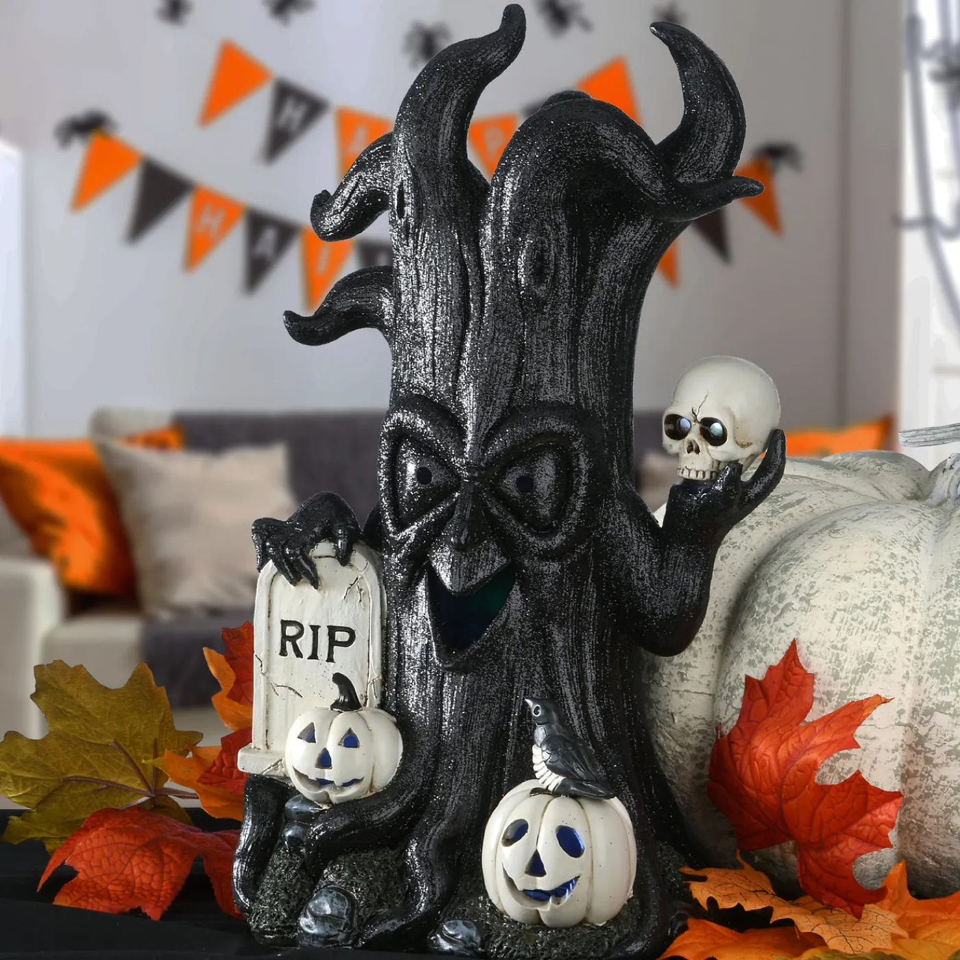 National Tree Company 15 in. Halloween Tree Holding Skull and RIP Tombstone with LED Lights