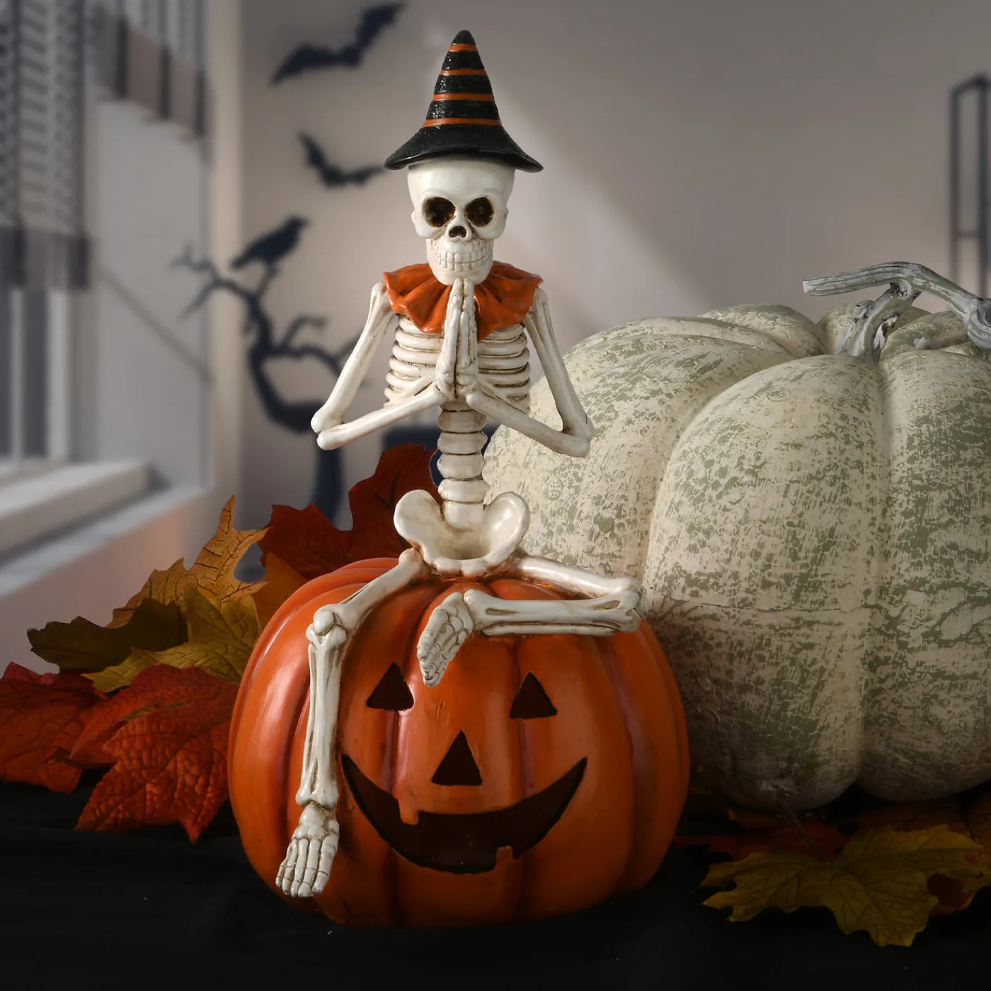 National Tree Company 12 in. Halloween Trick or Treat Skeleton on Jack O Lantern with LED Lights