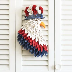 National Tree Company 14 in. Patriotic Hanging Eagle Decoration with Red White and Blue Wood Cuts and Flower Blooms