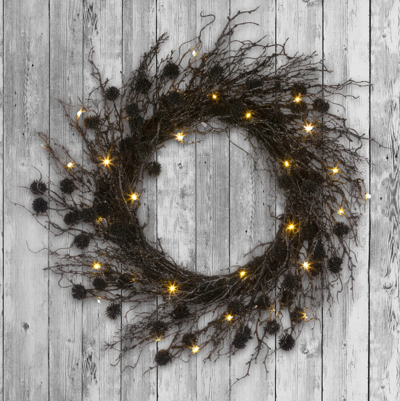 National Tree Company 24 in. Pre-Lit Halloween Deadwood Twig Wreath with LED Lights