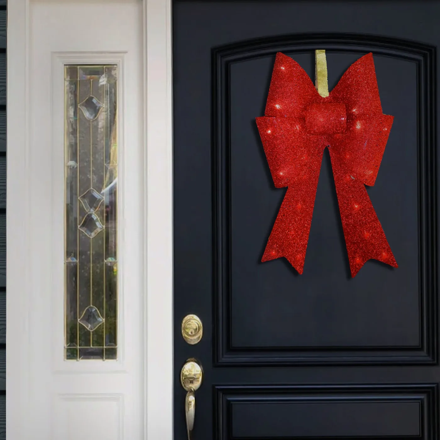National Tree Company 20 in. Pre-Lit Red Fabric Bow with Battery Operated LED Lights