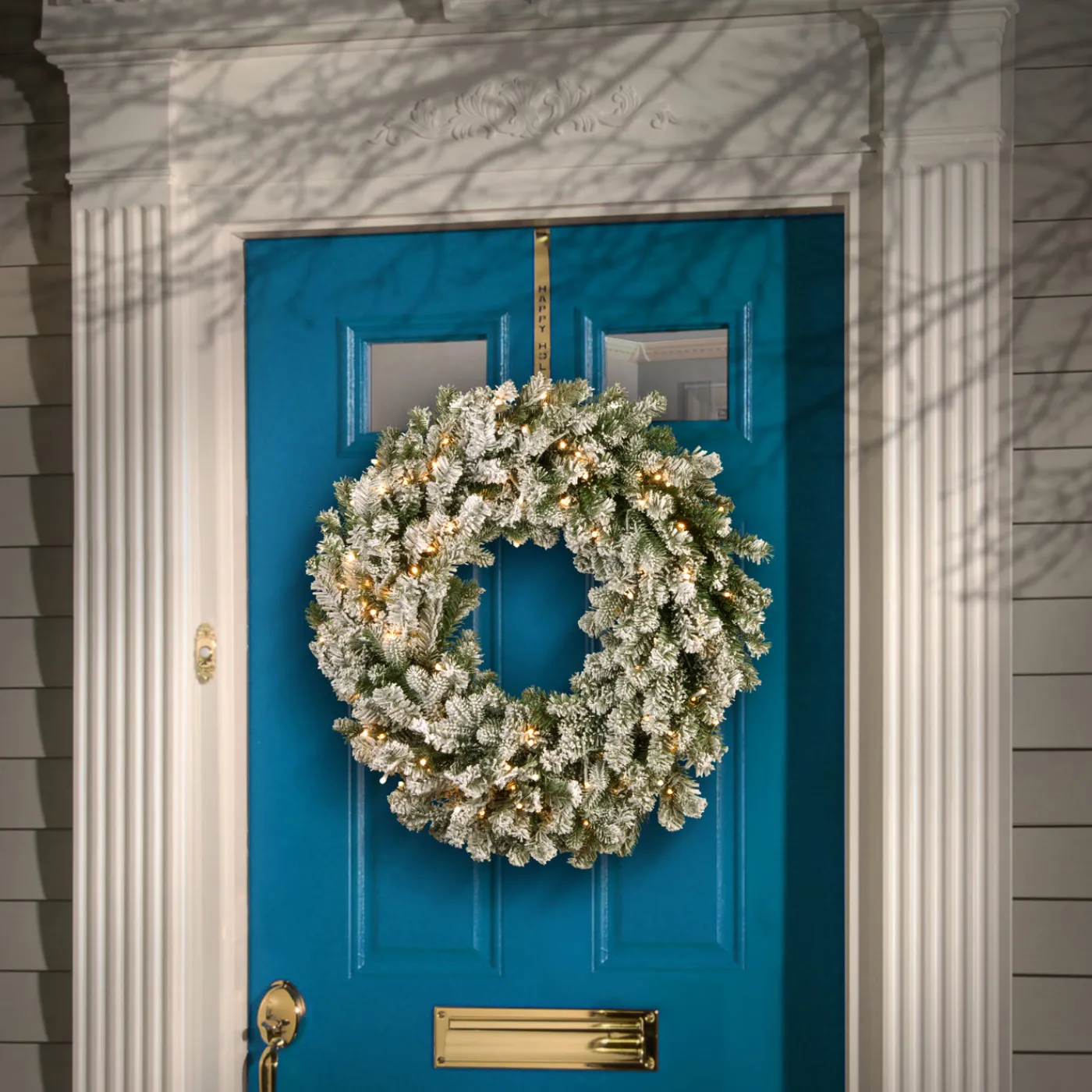 National Tree Company 24 in. Pre-Lit Snowy Sheffield Spruce Wreath with Twinkly LED Lights