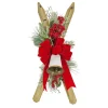National Tree Company 28 in. Ski's with Pine and Berry Plastic Swag