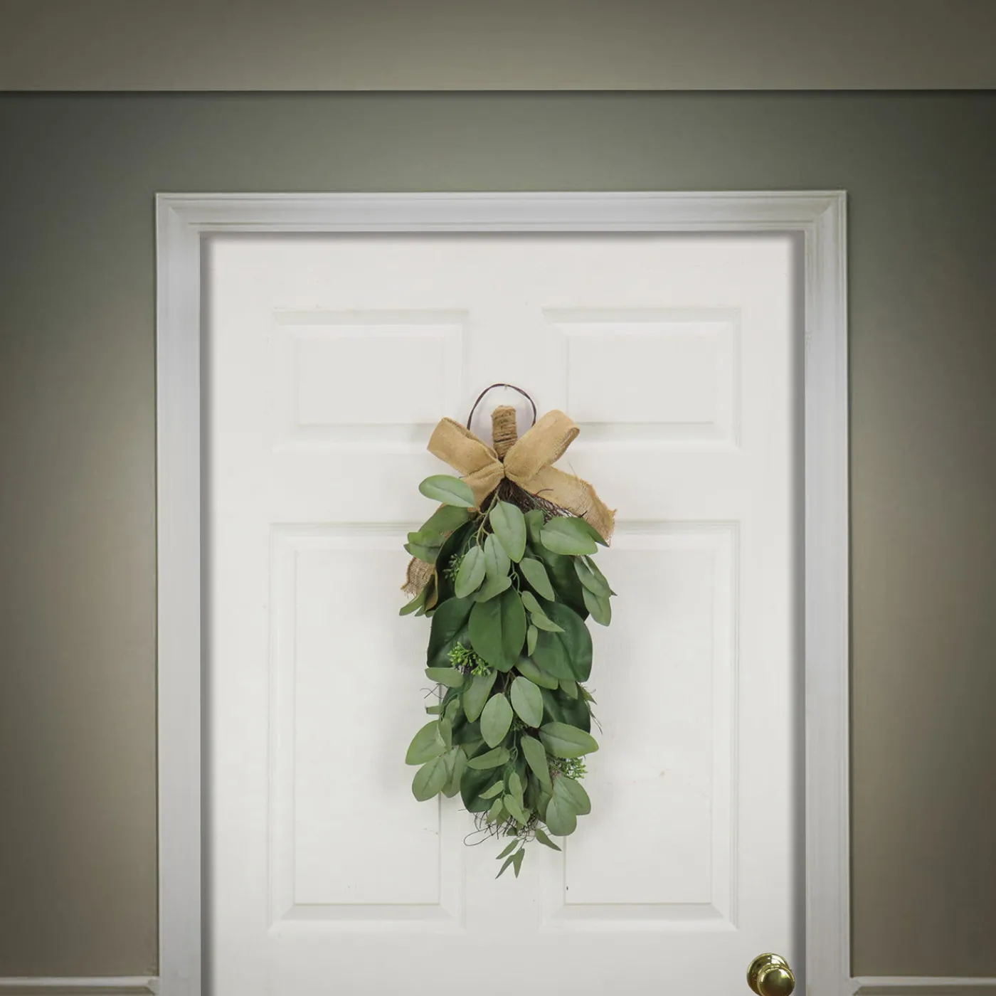 National Tree Company 26 in. Spring Teardrop Wall Hanging Decoration with Eucalyptus Leaves, Magnolia Blooms, Flowing Green Stems