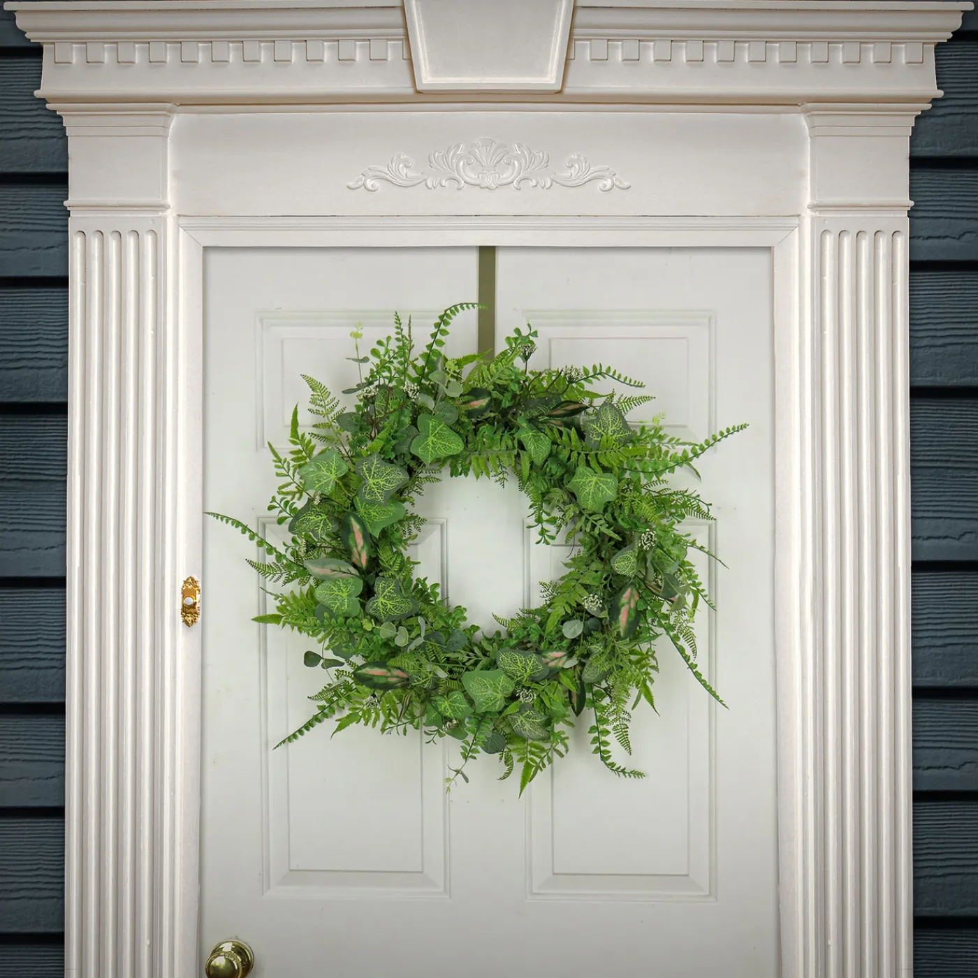 National Tree Company 26 in. Spring Wreath with Mixed Leaves and Greenery?